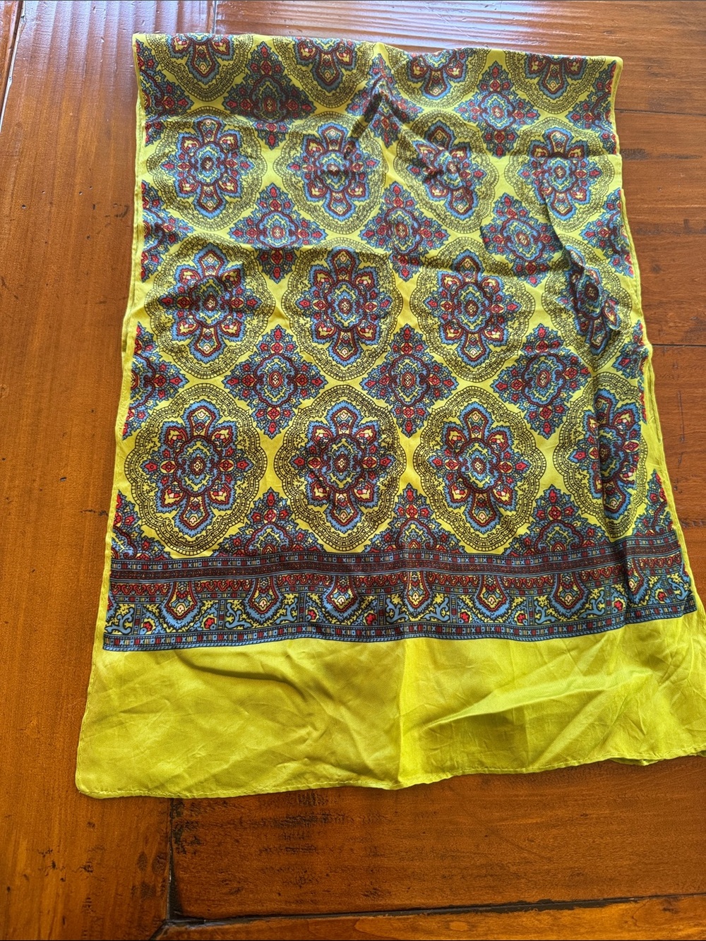 Fantastic vibrant 15”x42” hand rolled vintage scarf. Love the colors.